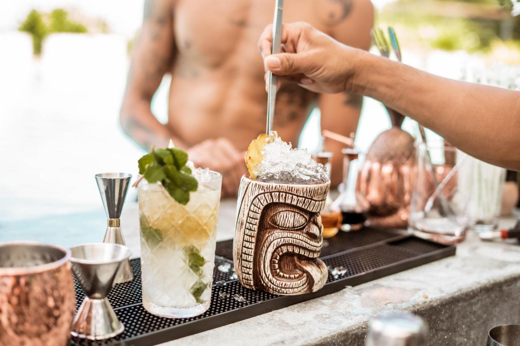 Skyview Resort Phuket Patong Beach Экстерьер фото A tiki drink being stirred